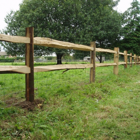 Cleft Chestnut Post and 2 rail installed - as field fencing