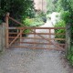 Hardwood Yeoman drive gate installed by Tate fencing