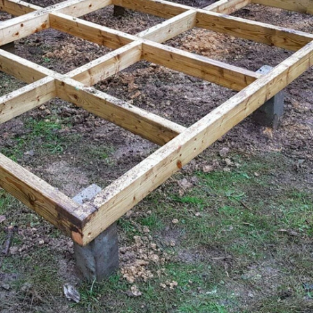 Concrete decking support post used to construct a shed base.