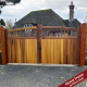 Pair of Iroko Curve Top Windsor Gates painted with teak oil
