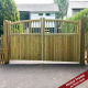 Curve top Windsor pair of gates with hour glass spindles